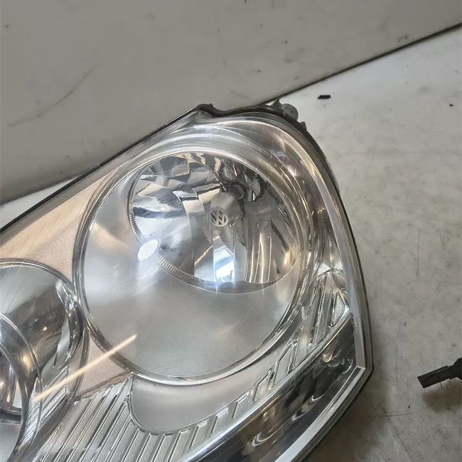 Proiettore sinistro AL cromato