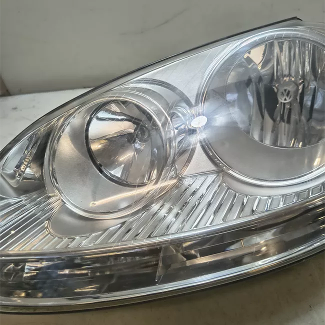 Proiettore sinistro AL cromato