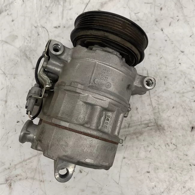 Compressore aria condizionata con giunto elettromagnetico