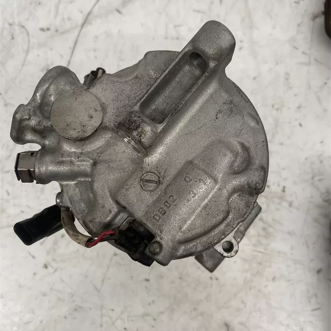 Compressore aria condizionata con giunto elettromagnetico