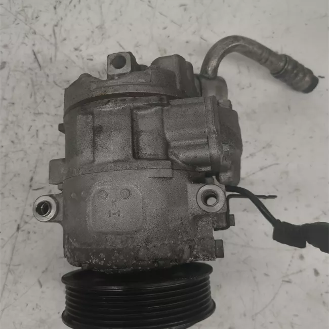 Compressore aria condizionata rotazionale ., Denso